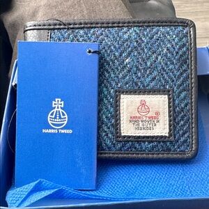 Harris Tweed men’s wallet new never been used still has tags and box